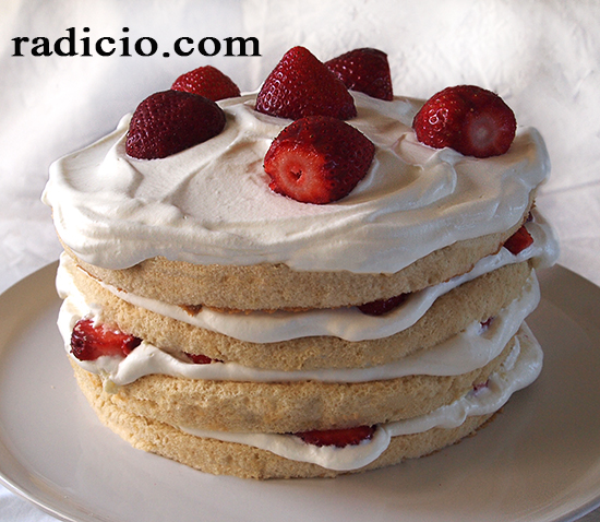 Cake with whipped cream and strawberries